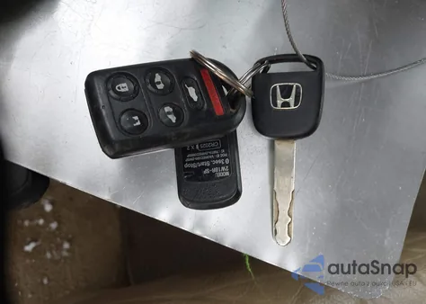 2010 Honda Odyssey Ex-L z USA, uszkodzony, nr VIN 5FNRL3H64AB076204